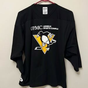 Youth boys size large Pittsburgh Penquins Hockey Jersey.
